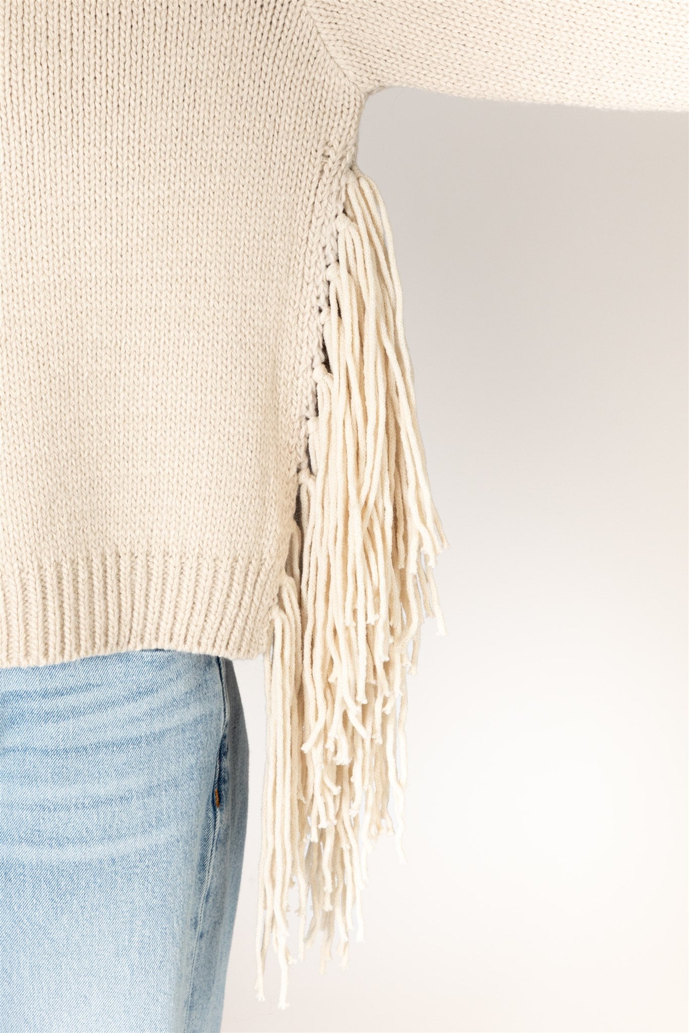 BUCK TASSEL SWEATER