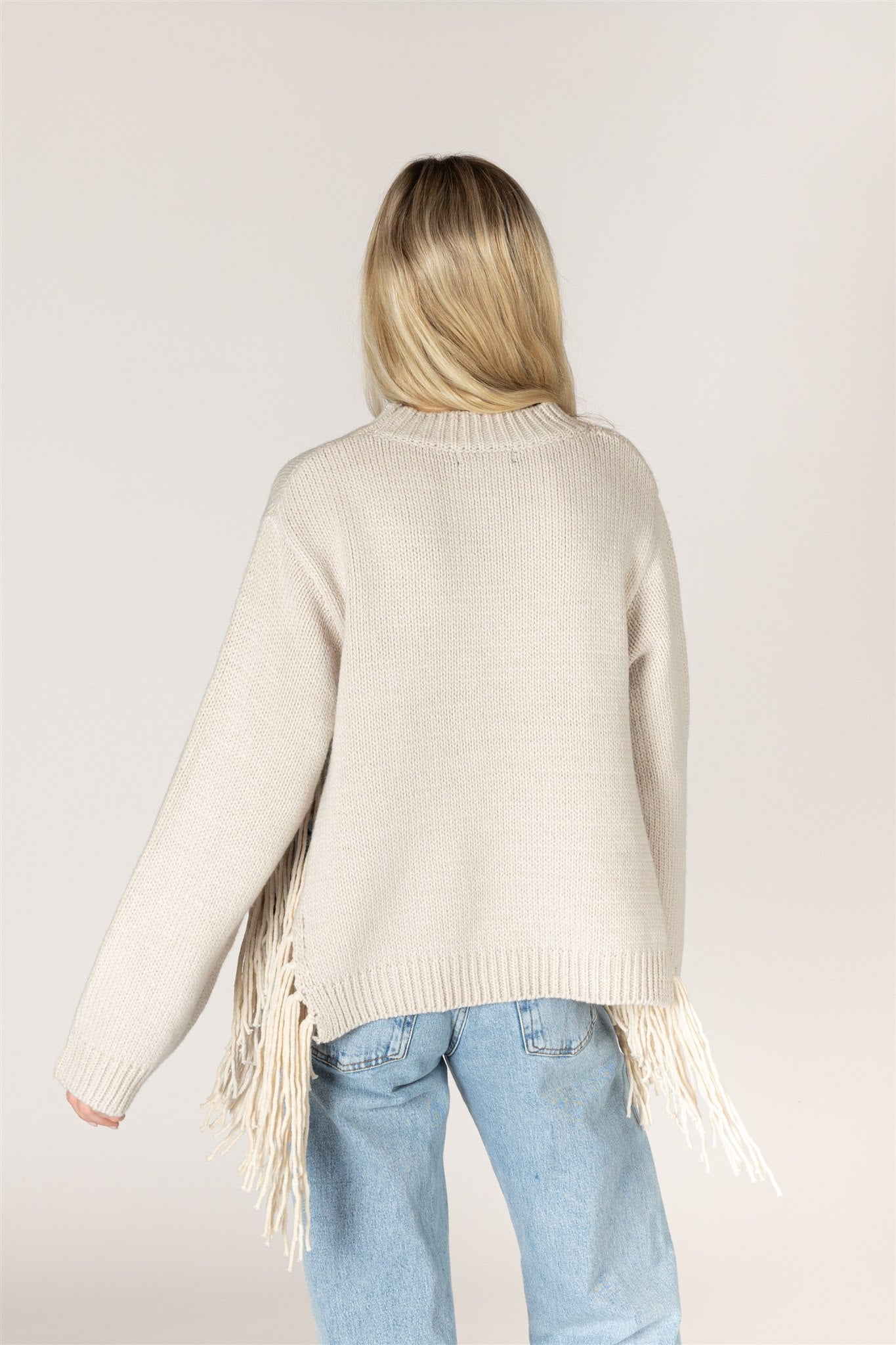 BUCK TASSEL SWEATER